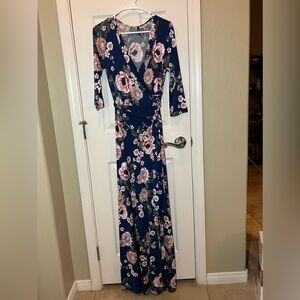 3/4 length sleeved maxi dress. Size Medium. Navy blue with pink floral design